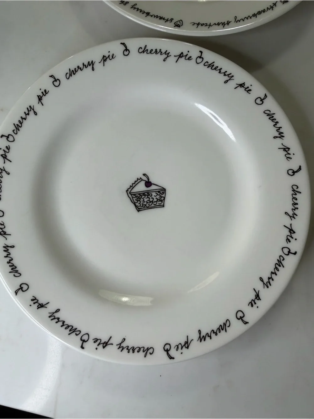 Pottery Barn porcelain Dessert Plates – White with Black Script and Cake Motifs